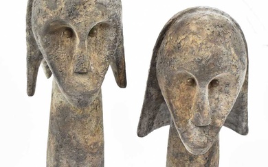Two Fang, Gabon, mask figures with elongated necks and presented...