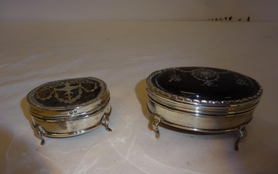 Two silver and tortoiseshell dressing table jewellery boxes....