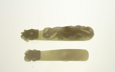 Two small pale celadon jade buckles