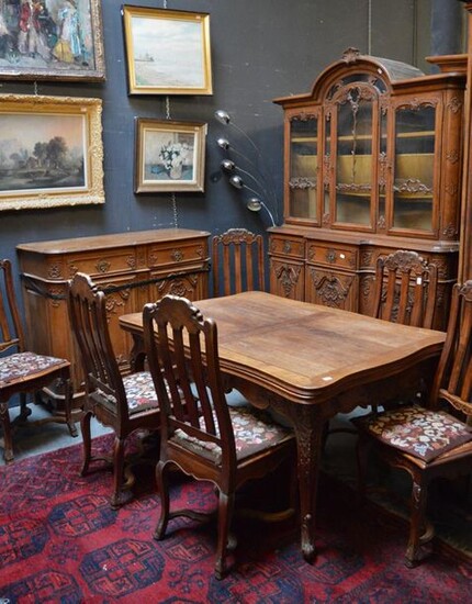 a dining room, table and 6 chairs, an oak chest...