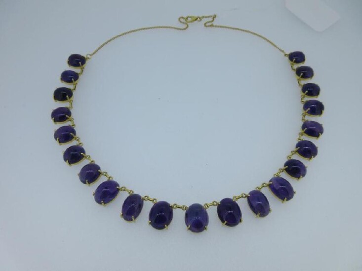 A necklace of oval amethysts
