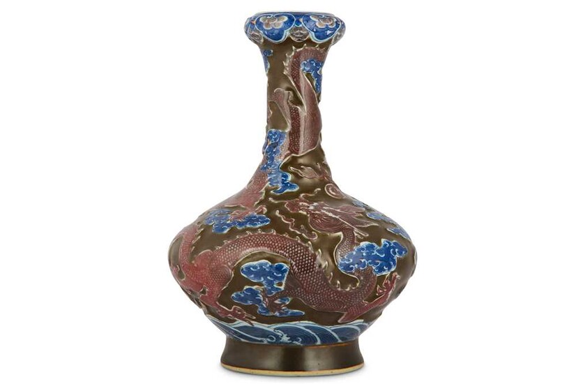 A CHINESE BROWN-GROUND AND UNDERGLAZE BLUE AND RED BOTTLE...