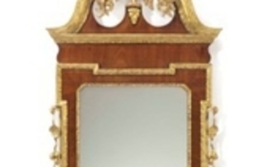 A CHIPPENDALE PARCEL-GILT MAHOGANY-VENEERED LOOKING GLASS, ENGLISH OR AMERICAN, 1760-1780