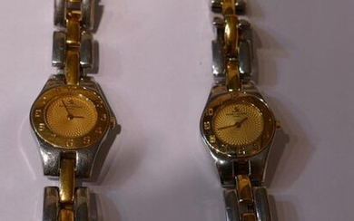 2 watches in steel and yellow gold from Baume et...