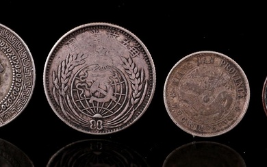 4 Chinese coins, largest 24 mm diameter, 16.6 grams (authenticity not guaranteed)