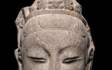 A carved stone head of a Bodhisattva