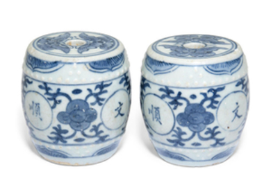 TWO INSCRIBED BLUE AND WHITE MINIATURE DRUM-FORM STOOLS, MING DYNASTY (1368-1644)