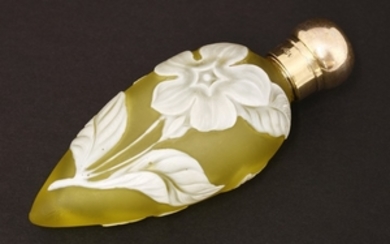 A cameo glass scent bottle, by Thomas Webb & Co, Stourbridge, the yellow glass of teardrop shape ...