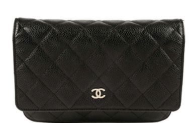 CHANEL - a black leather WOC handbag.