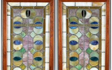 2 Framed stained glass panels.