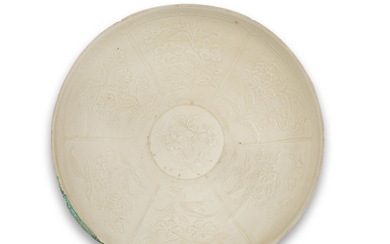 A rare Dingyao moulded 'floral' bowl