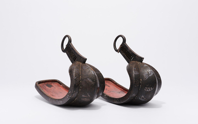 A pair of Kaga silver-inlaid iron stirrups, abumi