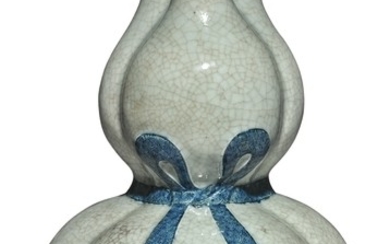 A MOLDED CRACKLE-GLAZED TRIPLE-SPOUTED DOUBLE GOURD VASE QING DYNASTY, DAOGUANG PERIOD