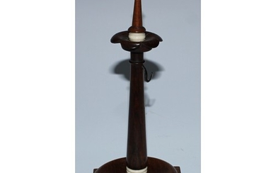 A 19th century rosewood pocket watch stand, the turned pilla...