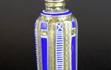 A 19th century white metal topped Bohemian cut crystal perfume bottle, H. 10cm.
