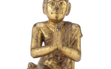 A BURMESE BLACK AND GOLD LACQUERED WOOD SCULPTURE LATE 19TH EARLY 20TH CENTURY.