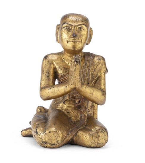 A BURMESE BLACK AND GOLD LACQUERED WOOD SCULPTURE LATE 19TH EARLY 20TH CENTURY.