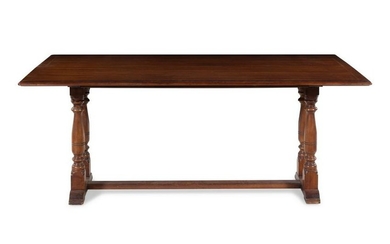 A Baroque Style Mahogany Extension Library Table