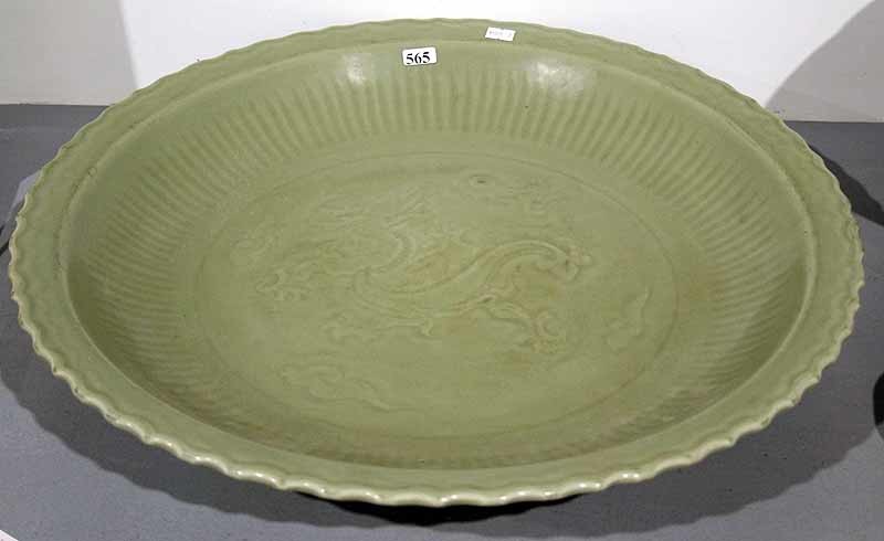 A CHINESE CELADON CHARGER