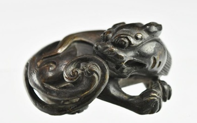 A CHINESE QING DYNASTY BRONZE RECUMBENT LION PAPERWEIGHT