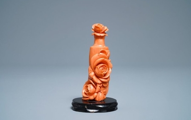 A Chinese carved red coral snuff bottle with...