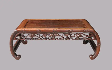 A Chinese hardwood low table, kang, late Qing dynasty, with curved legs...