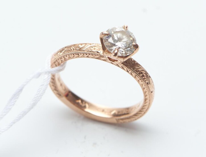 A DIAMOND SOLITAIRE RING IN 14CT PINK GOLD, CENTRALLY SET WITH A ROUND BRILLIANT CUT DIAMOND OF 0.80CT BY LINA JEWELS HAWAII, SIZE K...