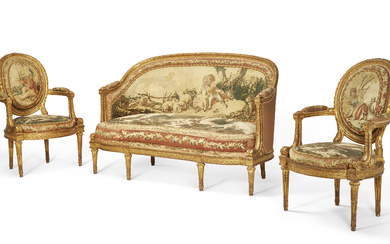 A FRENCH GILTWOOD THREE-PIECE SALON SUITE AFTER A DESIGN BY...