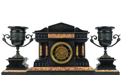 A French black slate and marble clock garniture. Late 19th c...