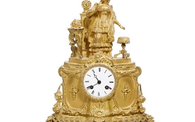 A French gilt bronze figural mantel clock, white enamel dial with Roman...