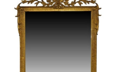 A French giltwood mirror, 18th century style, the bevelled plate beneath ribbon cresting, with label and stamped Carvers Guild, 90cm x 72cm Provenance: The Geoffrey and Fay Elliot collection.