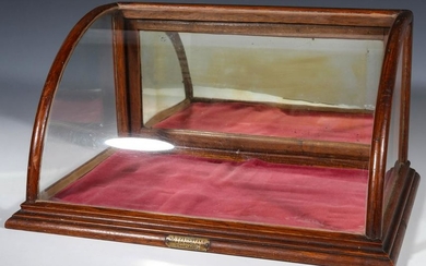 A GOOD SMALL ROUNDED FRONT COUNTER-TOP SHOWCASE C. 1910