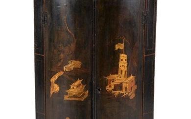 A George II green painted and parcel gilt chinoiserie decorated corner cupboard
