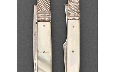 A George III silver folding fruit knife and fork, mother of ...