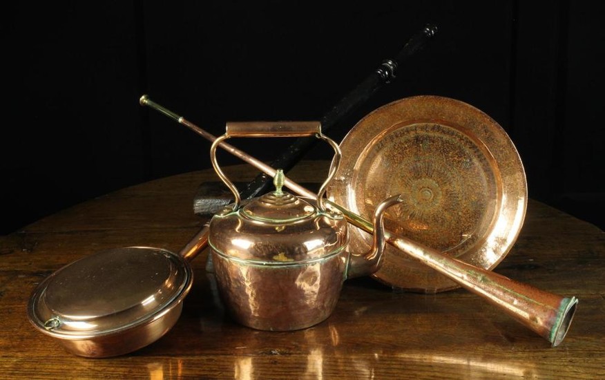A Georgian Copper Hob Kettle with brass acorn knop finial. A 19th century copper warming pan on a tu