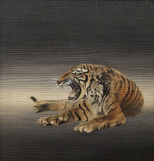 A Japanese textile picture of a recumbent roaring tiger in glazed pine frame, 55 x 53.5cm; together with a Japanese textile picture of two tigers, in a glazed oak frame, 37 x 46cm (2)