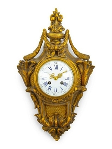 A Louis XVI Style Gilt Bronze Cartel Clock