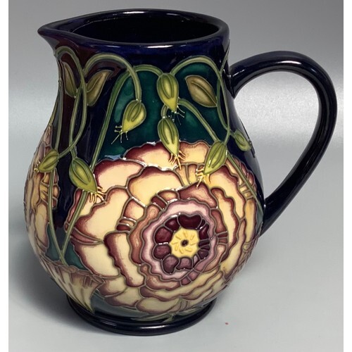 A Moorcroft Pottery 'Eustoma' jug, designed by Carole Lovatt...