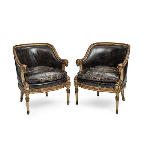 A PAIR OF NEOCLASSICAL PARCEL GILT AND PAINTED WOOD ARMCHAIRS
