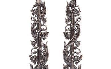 A PAIR OF POLISHED CAST IRON BALUSTER UPRIGHTS, LATE 19TH CENTURY