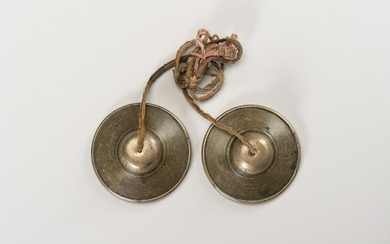A PAIR OF TWO SMALL TIBETIAN RITUAL CYMBALS