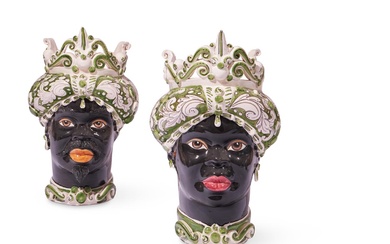 A PAIR OF VASES IN THE FORM OF MALE AND FEMALE MOORS HEADSSICILIAN
