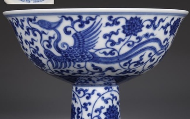 A PORCELAIN BOWL WITH PHOENIX AND LOTUS DESIGN.
