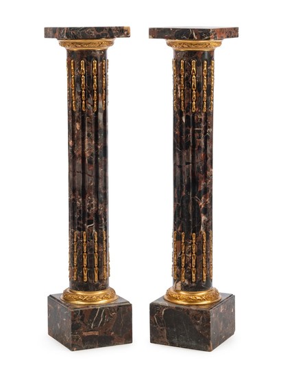 A Pair of Louis XVI Style Gilt Metal Mounted Marble Pedestals