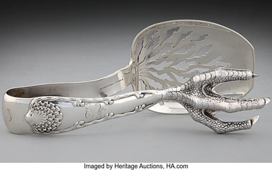 A Pair of Tiffany & Co. Wave Edge Pattern Silver Tongs (designed 1884)