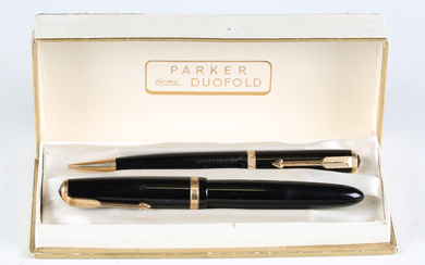 A Parker Duofold fountain pen and matching propelling pencil, the case detailed 'Parker demi Du