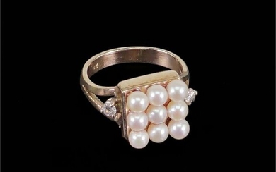 A Pearl & Diamond Ring.