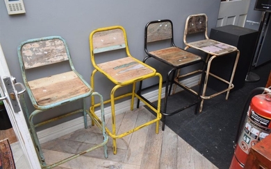 A SET OF FOUR INDUSTRIAL STYLE STOOLS