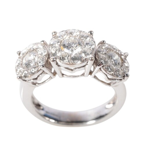 A TRIPLE CLUSTER DIAMOND RING three brilliant-cut diamonds, ...