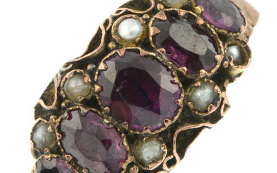 A Victorian 9ct gold garnet and split pearl dress ring.